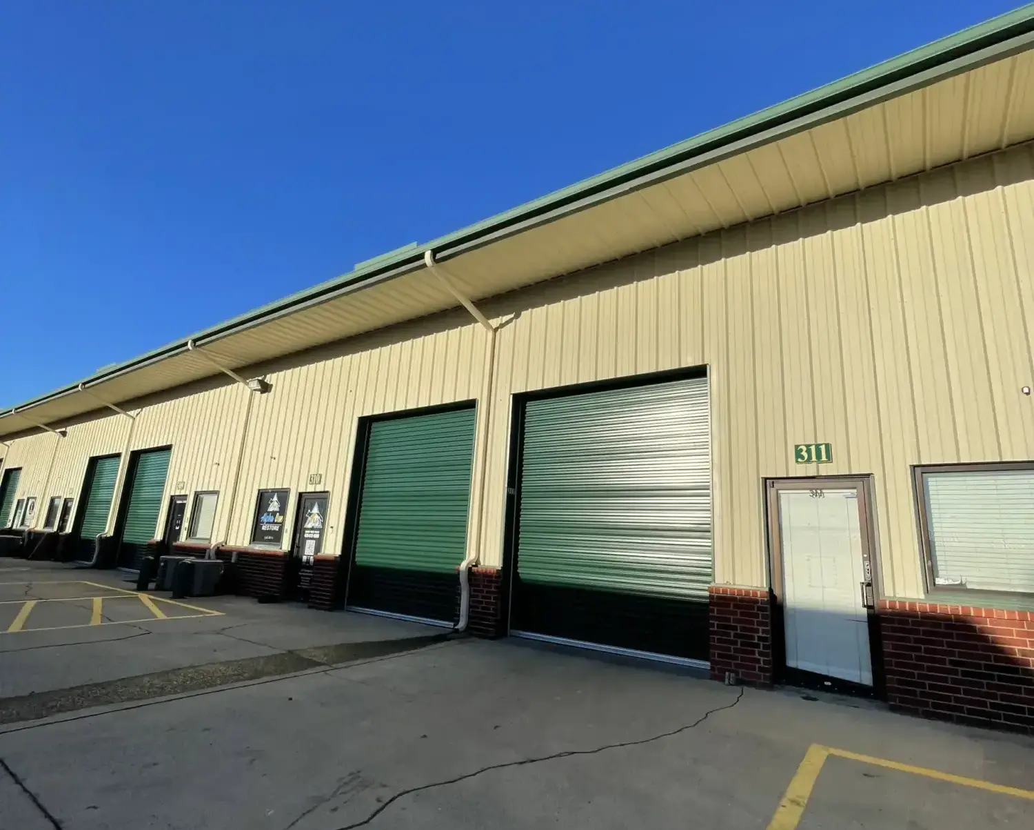 10' x 12 Roll Doors installed in Mckinney Texas by Switchback Construction